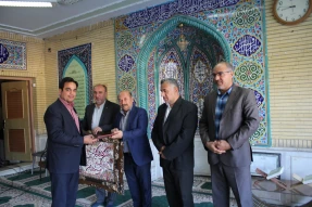 تجلیل از خانواده شهید مصلی نژاد